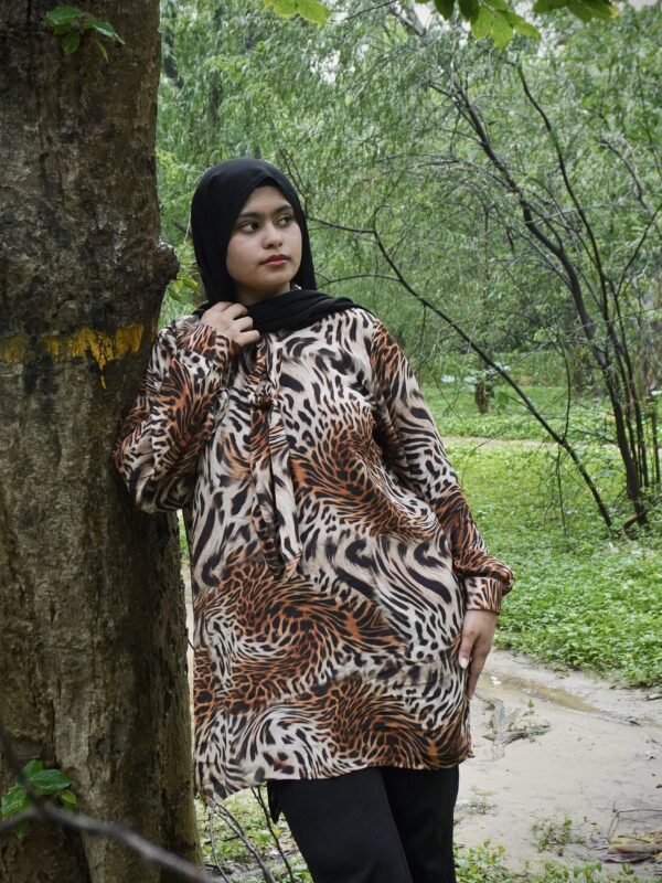 Animal print tie-neck top in organic viscose crepe